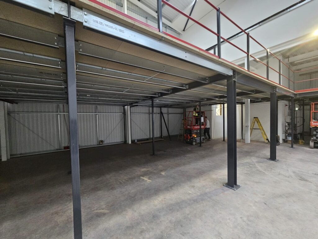 underneath mezzanine floor in warehouse